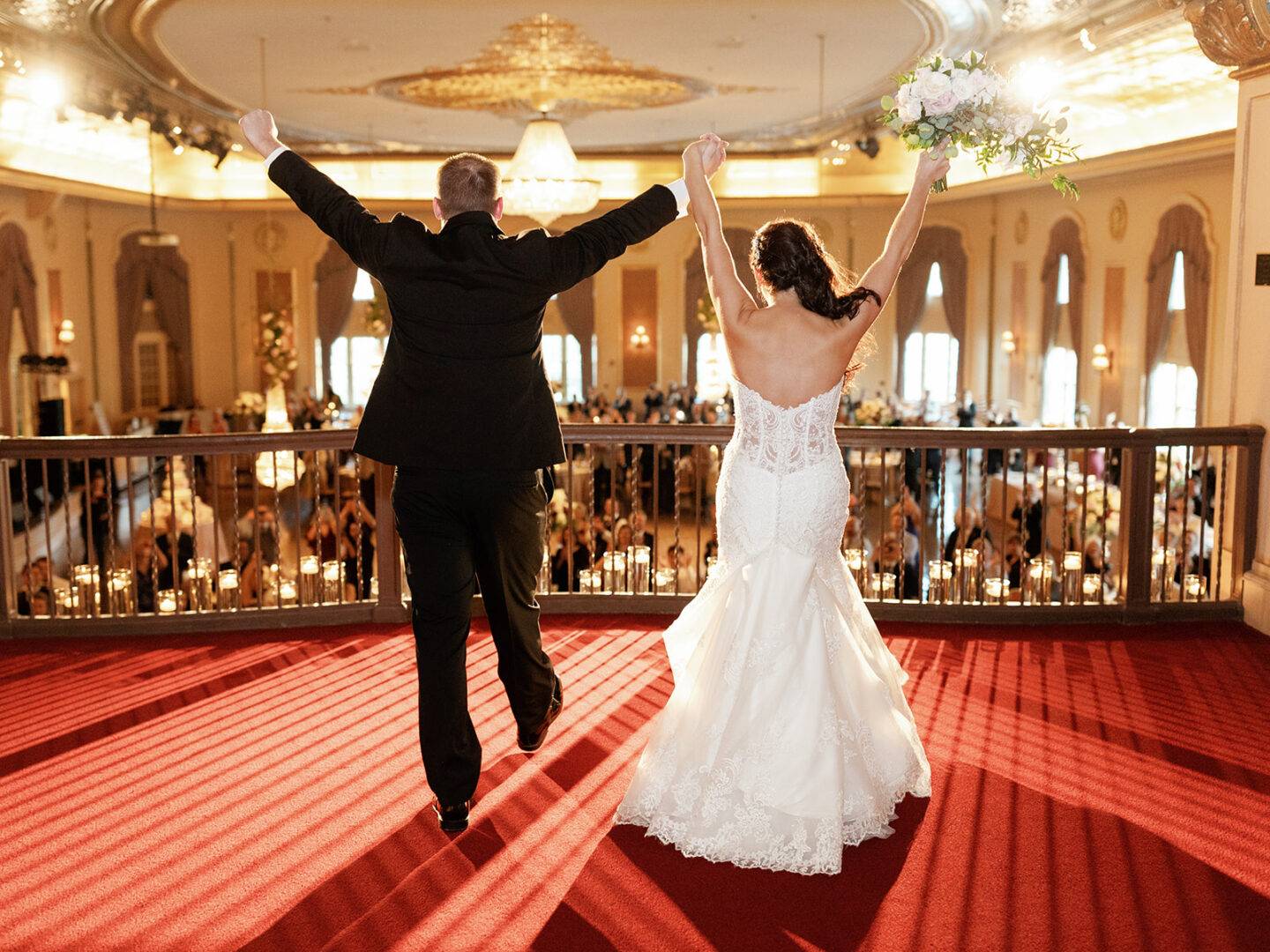 A couple is announced at their reception in the Palais Royale